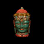 Wooden with stone work buddha head